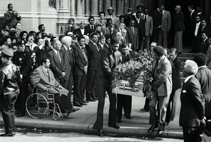 Robinson’s old teammates,along with Russell, carried the casket at his funeral in 1972.